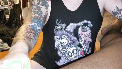 Tattooed white dude slobbers on a big black cock POV