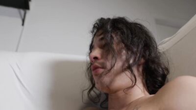 Long-haired fellow grabs his hard cock and jerks off a lot