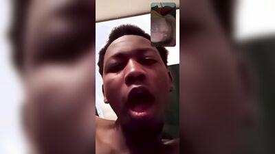 Horny black twink is filming himself while playing with hard cock