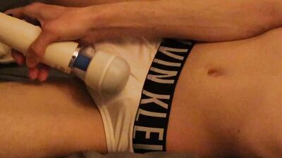 Chum is using a Hitachi magic wand to stimulate his cock