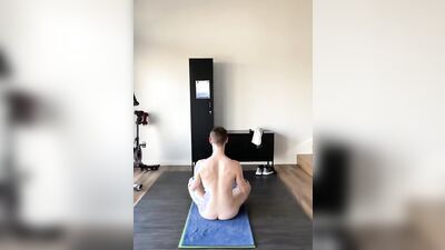 Horny lad is fully naked while doing exercises on the floor