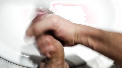 Guy gets horny in the bathroom and jerks off above that sink