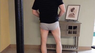 Freaky guy dances and takes his panties off to play with hard dick