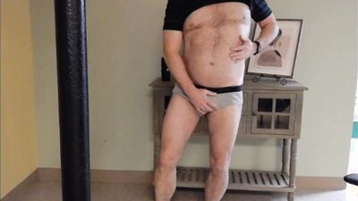 Freaky guy dances and takes his panties off to play with hard dick