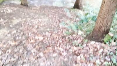 Horny lad is filing his hard pecker while jerking off by the creek