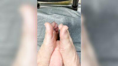 Naughty guy is practicing footjob skills on that big dildo
