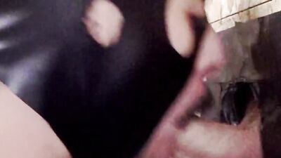 Gimp licks that hard cock and sucks it through a gloryhole