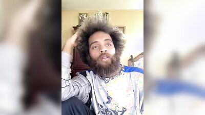 Lovely guy with a cute beard does a food review