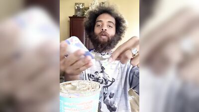 Lovely guy with a cute beard does a food review