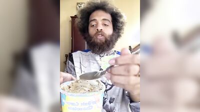 Lovely guy with a cute beard does a food review