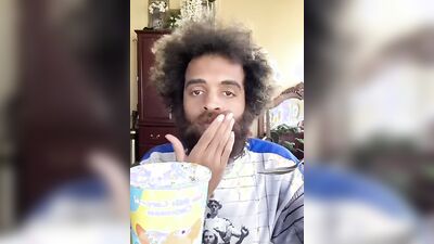 Lovely guy with a cute beard does a food review