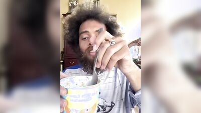 Lovely guy with a cute beard does a food review