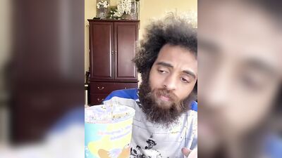 Lovely guy with a cute beard does a food review