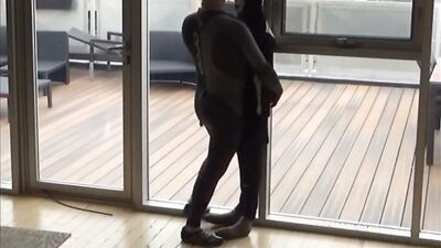 wetsuited silicone masked guy cums on his dummy at patio windows