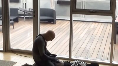 wetsuited silicone masked guy cums on his dummy at patio windows