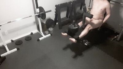 Exhibitionistic chubby guy is working out naked in the gym