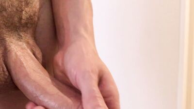 Naked lad dances for the camera and plays with his pecker