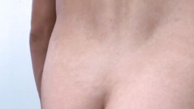 Naked lad dances for the camera and plays with his pecker