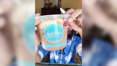 Handsome guy with a sexy beard does a smoothie bowl review