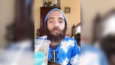 Handsome guy with a sexy beard does a smoothie bowl review