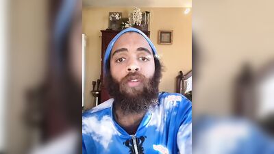 Handsome guy with a sexy beard does a smoothie bowl review