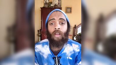 Handsome guy with a sexy beard does a smoothie bowl review