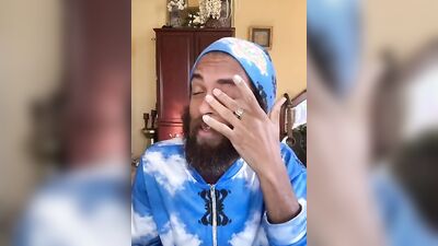 Handsome guy with a sexy beard does a smoothie bowl review