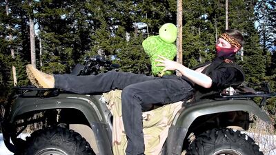 Horny man is fucking a stuffed doll in the open air