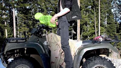 Horny man is fucking a stuffed doll in the open air