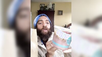 Cute bearded guy has fun doing a food bowl review