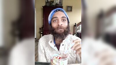 Cute bearded guy has fun doing a food bowl review