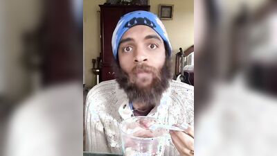 Cute bearded guy has fun doing a food bowl review