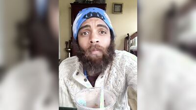 Cute bearded guy has fun doing a food bowl review