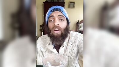 Cute bearded guy has fun doing a food bowl review