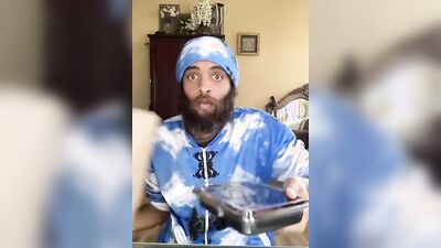 Cute Latino with a sexy beard does a food review