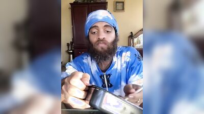 Cute Latino with a sexy beard does a food review
