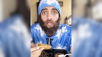 Cute Latino with a sexy beard does a food review
