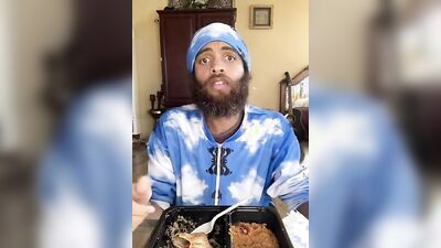 Cute Latino with a sexy beard does a food review