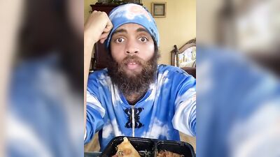 Cute Latino with a sexy beard does a food review