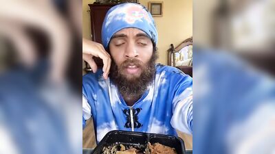 Cute Latino with a sexy beard does a food review