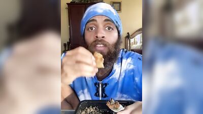 Cute Latino with a sexy beard does a food review