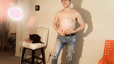 Naughty man gets naked and plays with his dick on the floor