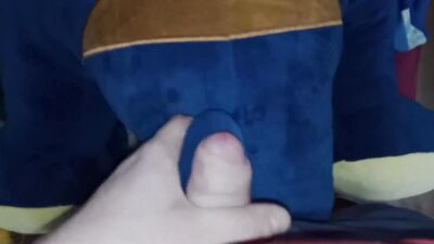 This perverted lad gets excited ribbing cock against stuffed doll