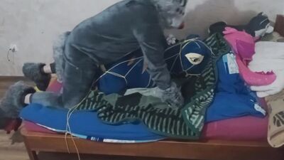 Guy in a costume is humping that stuffed doll on webcam video
