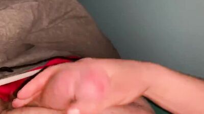 Small-dicked guy is filming his sloppy cock while jerking off