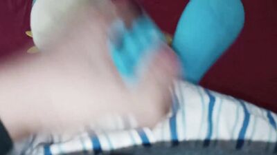 Pervert is filming his cock while rubbing it against stuffed doll