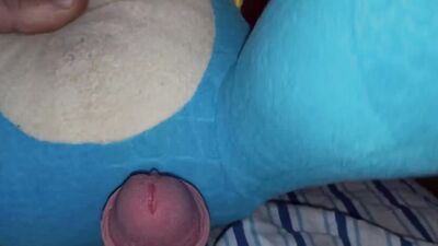 Pervert is filming his cock while rubbing it against stuffed doll