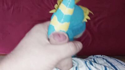 Pervert is filming his cock while rubbing it against stuffed doll