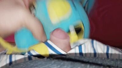 Pervert is filming his cock while rubbing it against stuffed doll