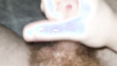 Hairy man is filming his pecker while stroking it for the camera